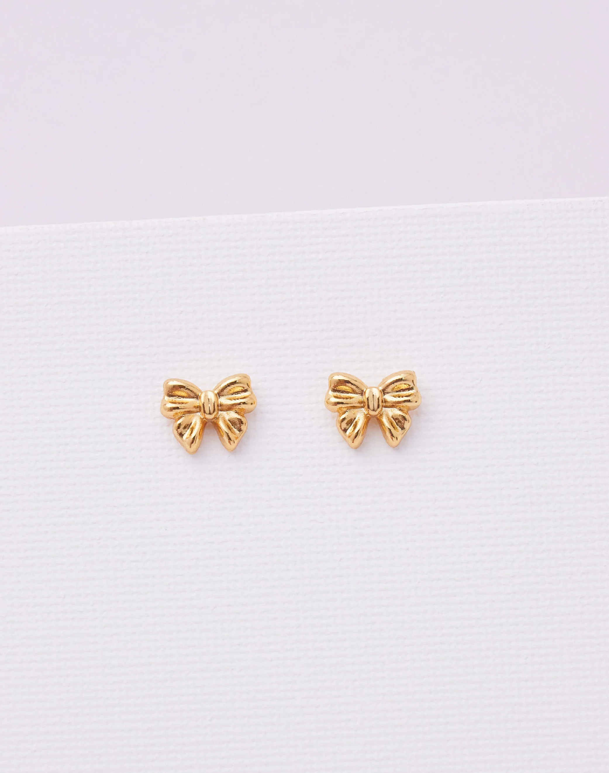 Aretes Moño